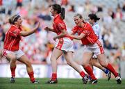 28 September 2008; Ciara O'Sullivan, centre, Cork, is congratulated by team-mates Valerie Mulcahy, left, and Mary O'Connor after scoring their side's second goal. TG4 All-Ireland Ladies Senior Football Championship Final, Cork v Monaghan, Croke Park, Dublin. Picture credit: Brendan Moran / SPORTSFILE