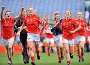28 September 2008; Cork players, left to right, Briege Corkery, captain Angela Walsh and Mary O'Connor celebrate with the cup. TG4 All-Ireland Ladies Senior Football Championship Final, Cork v Monaghan, Croke Park, Dublin. Picture credit: David Maher / SPORTSFILE