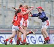 28 September 2008; Cork player Ciara O'Sullivan, left, celebrates with goalkeeper Elaine Harte along with their team-mates at the end of the game. TG4 All-Ireland Ladies Senior Football Championship Final, Cork v Monaghan, Croke Park, Dublin. Picture credit: David Maher / SPORTSFILE