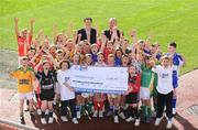 30 September 2008; The love for, and pride in, the GAA, which is shared by thousands of GAA fans around the country, is responsible for raising 3.4 million euro for GAA clubs and schools over the past four years. This innovative but simple scheme sees 15% of call costs being donated back to customers' preferred club or school, while at the same time saving them money on their home phone and Broadband bills. All 32 County Boards support the scheme which sees 2,500 Clubs around the country receive cheques from Gaelic Telecom twice a year. Pictured at the announcement are, Ciaran Doyle, General manager, Gaelic Telecom and Nickey Brennan, President of the GAA with children from the 32 counties. Croke Park, Dublin. Picture credit: Brendan Moran / SPORTSFILE