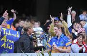 28 September 2008; Tipperary captain Angie McDermott is presented with the trophy by Geraldine Giles, President, Cumann Peil Gael na mBan. TG4 All-Ireland Ladies Intermediate Football Championship Final, Clare v Tipperary, Croke Park, Dublin. Picture credit: Brendan Moran / SPORTSFILE