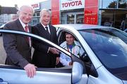 30 September 2008; The Olympic Council of Ireland in association with the Carroll and Kinsella Motor Group presented a Toyota Corolla car to boxer Kenny Egan in recognition of his silver medal performance at the Beijing Olympics. Making the presentation at Carroll and Kinsella’s Showroom in Walkinstown, Fonsie Carroll of Carroll and Kinsella’s, congratulated Kenny on his superb efforts and wished him many miles of happy motoring. Pictured with Kenny are, Pat Hickey, left, President of the Olympic Council of Ireland and Fonsie Carroll, Director of Carroll & Kinsella. Carroll & Kinsella Showrooms, Walkinstown, Co. Dublin. Picture credit: Brendan Moran / SPORTSFILE