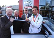 16 October 2008; The Olympic Council of Ireland in association with the Carroll and Kinsella Motor Group presented a Toyota Corolla car to boxer Kenny Egan in recognition of his silver medal performance at the Beijing Olympics. Making the presentation at Carroll and Kinsella’s Showroom in Walkinstown, Fonsie Carroll of Carroll and Kinsella’s, congratulated Kenny on his superb efforts and wished him many miles of happy motoring. Pictured with Kenny are, Pat Hickey, left, President of the Olympic Council of Ireland, Fonsie Carroll, centre, and Loughlin Murphy, Directors of Carroll & Kinsella, Walkinstown and Churchtown. Carroll & Kinsella Showrooms, Walkinstown, Co. Dublin. Picture credit: Brendan Moran / SPORTSFILE
