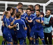 9 July 2015; Arturs Karasausks, second from right, Skonto Riga, celebrates with team-mates after scoring his side's second goal. UEFA Europa League First Qualifying Round 2nd leg, St Patrick's Athletic v Skonto Riga. Richmond Park, Inchicore, Dublin. Picture credit: David Maher / SPORTSFILE