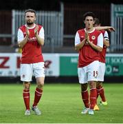 9 July 2015; St Patrick's Athletic's Conan Byrne, left, and Jamie McGrath at the end of the game. UEFA Europa League First Qualifying Round 2nd leg, St Patrick's Athletic v Skonto Riga. Richmond Park, Inchicore, Dublin. Picture credit: David Maher / SPORTSFILE