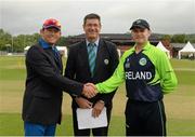 10 July 2015; Team captains Nicolaas Scholtz, Namibia, and William Porterfield, Ireland, in the company of match referee Steve Bernard, shake hands before the game. ICC World Twenty20 Qualifier 2015, Ireland v Namibia. Stormont, Belfast. Picture credit: Oliver McVeigh / ICC / SPORTSFILE