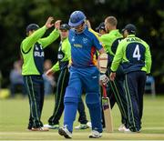 10 July 2015; Gerrie Snyman, Namibia, walks away after losing his wicket to John Mooney, Ireland. ICC World Twenty20 Qualifier 2015, Ireland v Namibia. Stormont, Belfast. Picture credit: Oliver McVeigh / ICC / SPORTSFILE