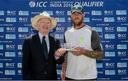 10 July 2015; Cricket Ireland President Dr Murray Power  presents the Man of the Match award to Ireland's John Mooney. ICC World Twenty20 Qualifier 2015, Ireland v Namibia. Stormont, Belfast. Picture credit: Oliver McVeigh / ICC / SPORTSFILE