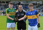 5 July 2015; Team captains Mark O'Connor, left, Kerry, and Danny Owens, Tipperary, shake hands in the company of referee Kevin Murphy before the game. Electric Ireland Munster GAA Football Minor Championship Final, Kerry v Tipperary. Fitzgerald Stadium, Killarney, Co. Kerry.  Picture credit: Brendan Moran / SPORTSFILE