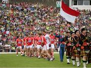 5 July 2015; The Cork team break from the pre-match parade. Munster GAA Football Senior Championship Final, Kerry v Cork. Fitzgerald Stadium, Killarney, Co. Kerry. Picture credit: Stephen McCarthy / SPORTSFILE