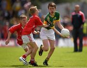 5 July 2015; Aodán Ó Dubháin, Scoil an Fhirtéaraigh, Kerry, and Lorcan O'Leary, Timoleague NS, during the Munster GAA Primary Game. Munster GAA Football Senior Championship Final, Kerry v Cork. Fitzgerald Stadium, Killarney, Co. Kerry. Picture credit: Stephen McCarthy / SPORTSFILE