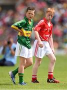 5 July 2015; Darragh O'Sullivan, Fenit NS, Kerry, and Liam Hodnett, Scoil Bhríde, Ballydehob, Cork, during the Munster GAA Primary Game. Munster GAA Football Senior Championship Final, Kerry v Cork. Fitzgerald Stadium, Killarney, Co. Kerry. Picture credit: Stephen McCarthy / SPORTSFILE