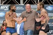 10 July 2015; Chad Mendes and Conor McGregor are seperated by UFC President Dana White following weighs in ahead of their UFC 189 Interim Featherweight Title fight. MGM Grand Garden Arena, Las Vegas, USA. Picture credit: Esther Lin / SPORTSFILE