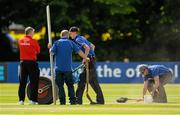 10 July 2015; Ground staff repairing the wicket between innings. ICC World Twenty20 Qualifier 2015, Ireland v Namibia. Stormont, Belfast. Picture credit: Oliver McVeigh / ICC / SPORTSFILE