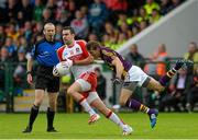 11 July 2015; Caolan O'Boyle, Derry, in action against Adrian Flynn, Wexford. GAA Football All-Ireland Senior Championship, Round 2B, Derry v Wexford, Owenbeg, Derry. Picture credit: Oliver McVeigh / SPORTSFILE