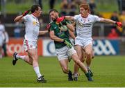 11 July 2015; Michael Newman, Meath, in action against Aidan McCrory, left, and Peter Harte, Tyrone. GAA Football All-Ireland Senior Championship, Round 2B, Tyrone v Meath, Healy Park, Omagh, Co. Tyrone. Photo by Sportsfile