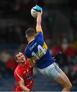11 July 2015; Michael Quinlivan, Tipperary, in action against Dessie Finnegan, Louth. GAA Football All-Ireland Senior Championship, Round 2B, Tipperary v Louth, Semple Stadium, Thurles, Co. Tipperary. Picture credit: Ray McManus / SPORTSFILE