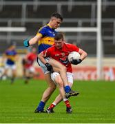 11 July 2015; Conal McCeever, Louth, in action against Michael Quinlivan, Tipperary. GAA Football All-Ireland Senior Championship, Round 2B, Tipperary v Louth, Semple Stadium, Thurles, Co. Tipperary. Picture credit: Ray McManus / SPORTSFILE