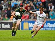 11 July 2015; Harry Rooney, Meath, in action against Peter Harte, Tyrone. GAA Football All-Ireland Senior Championship, Round 2B, Tyrone v Meath, Healy Park, Omagh, Co. Tyrone. Photo by Sportsfile