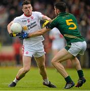 11 July 2015; Connor McAliskey, Tyrone, in action against Donal Keogan, Meath. GAA Football All-Ireland Senior Championship, Round 2B, Tyrone v Meath, Healy Park, Omagh, Co. Tyrone. Picture credit: Brendan Moran / SPORTSFILE
