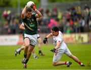 11 July 2015; Bryan Menton, Meath, in action against Mattie Donnelly, Tyrone. GAA Football All-Ireland Senior Championship, Round 2B, Tyrone v Meath, Healy Park, Omagh, Co. Tyrone. Photo by Sportsfile