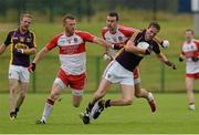 11 July 2015; Colm Kehoe, Wexford, in action against Fergal Doherty and Caolan O'Boyle, Derry. GAA Football All-Ireland Senior Championship, Round 2B, Derry v Wexford, Owenbeg, Derry. Picture credit: Oliver McVeigh / SPORTSFILE