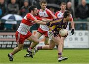 11 July 2015; Ben Brosnan, Wexford, in action against  Oisin Duffy, Derry. GAA Football All-Ireland Senior Championship, Round 2B, Derry v Wexford, Owenbeg, Derry. Picture credit: Oliver McVeigh / SPORTSFILE