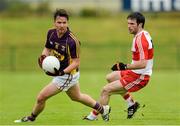 11 July 2015; Ben Brosnan, Wexford, in action against Oisin Duffy, Derry. GAA Football All-Ireland Senior Championship, Round 2B, Derry v Wexford, Owenbeg, Derry. Picture credit: Oliver McVeigh / SPORTSFILE