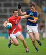 11 July 2015; Declan Byrne, Louth, in action against Liam Casey, Tipperary. GAA Football All-Ireland Senior Championship, Round 2B, Tipperary v Louth. Semple Stadium, Thurles, Co. Tipperary. Picture credit: Stephen McCarthy / SPORTSFILE