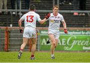 11 July 2015; Peter Harte, right, Tyrone, is congratulated by team-mate Darren McCurry, after scoring their side's goal from a penalty. GAA Football All-Ireland Senior Championship, Round 2B, Tyrone v Meath, Healy Park, Omagh, Co. Tyrone. Picture credit: Brendan Moran / SPORTSFILE