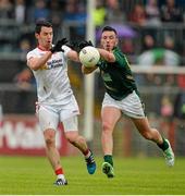 11 July 2015; Mattie Donnelly, Tyrone, in action against Andrew Tormey, Meath. GAA Football All-Ireland Senior Championship, Round 2B, Tyrone v Meath, Healy Park, Omagh, Co. Tyrone. Picture credit: Brendan Moran / SPORTSFILE
