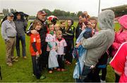 11 July 2015; Tyrone manager Mickey Harte gets pictures taken with supporters after the game. GAA Football All-Ireland Senior Championship, Round 2B, Tyrone v Meath, Healy Park, Omagh, Co. Tyrone. Photo by Sportsfile