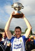 5 October 2008; Ballinderry captain Enda Muldoon lifts the McLaughlin cup. Derry County Senior Football Final, Slaughtneil v Ballinderry, Celtic Park, Derry. Picture credit: Oliver McVeigh / SPORTSFILE