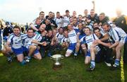 5 October 2008; The Ballinderry squad celebrate with the  McLaughlin cup. Derry County Senior Football Final, Slaughtneil v Ballinderry, Celtic Park, Derry. Picture credit: Oliver McVeigh / SPORTSFILE