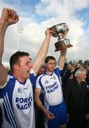 5 October 2008; Darren Conway and Enda Muldoon, Ballinderry, celebrate with the McLaughlin cup after the game. Derry County Senior Football Final, Slaughtneil v Ballinderry, Celtic Park, Derry. Picture credit: Oliver McVeigh / SPORTSFILE
