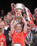 28 September 2008; Mary O'Connor, Cork, lifts the Brendan Martin cup after victory over Monaghan. TG4 All-Ireland Ladies Senior Football Championship Final, Cork v Monaghan, Croke Park, Dublin. Picture credit: Brendan Moran / SPORTSFILE