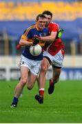 11 July 2015; Séamus Kennedy, Tipperary, in action against James Califf, Louth. GAA Football All-Ireland Senior Championship, Round 2B, Tipperary v Louth, Semple Stadium, Thurles, Co. Tipperary.