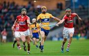 11 July 2015; Cian Dillon, Clare, in action against Aidan Walsh, left, and Stephen McDonnell, Cork. GAA Hurling All-Ireland Senior Championship, Round 2, Clare v Cork. Semple Stadium, Thurles, Co. Tipperary. Picture credit: Stephen McCarthy / SPORTSFILE