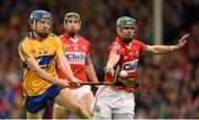 11 July 2015; Shane O’Donnell, Clare, in action against Brian Murphy, Cork. GAA Hurling All-Ireland Senior Championship, Round 2, Clare v Cork. Semple Stadium, Thurles, Co. Tipperary. Picture credit: Stephen McCarthy / SPORTSFILE