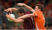 12 July 2015; Damien Comer, Galway, in action against Charlie Vernon, Armagh. GAA Football All-Ireland Senior Championship, Round 2B, Armagh v Galway, Athletic Grounds, Armagh. Picture credit: Matt Browne / SPORTSFILE