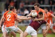 12 July 2015; Damien Comer, Galway, in action against Andy Mallon, left, Aidan Forker and Brendan Donaghy, Armagh. GAA Football All-Ireland Senior Championship, Round 2B, Armagh v Galway, Athletic Grounds, Armagh. Picture credit: Matt Browne / SPORTSFILE
