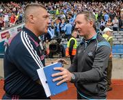 12 July 2015; Dublin manager Jim Gavin, right, shakes hands with Westmeath manager Tom Cribbin after the game. Leinster GAA Football Senior Championship Final, Westmeath v Dublin, Croke Park, Dublin. Picture credit: Brendan Moran / SPORTSFILE