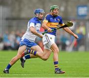 12 July 2015; James Woodlock, Tipperary, in action against Colin Dunford, Waterford. Munster GAA Hurling Senior Championship Final, Tipperary v Waterford, Semple Stadium, Thurles, Co. Tipperary. Picture credit: Ray McManus / SPORTSFILE