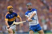 12 July 2015; Colin Dunford, Waterford, in action against Kieran Bergin, Tipperary. Munster GAA Hurling Senior Championship Final, Tipperary v Waterford. Semple Stadium, Thurles, Co. Tipperary. Picture credit: Stephen McCarthy / SPORTSFILE