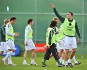 11 October 2008; Republic of Ireland's John O'Shea throws his water bottle away during squad training. Gannon Park, Malahide, Dublin. Picture credit: David Maher / SPORTSFILE