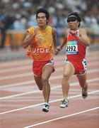 8 September 2008; Vietnam's Cuong Van Dao and his guide in action during the Men's 100m - T11. Beijing Paralympic Games 2008, National Stadium, Olympic Green, Beijing, China. Picture credit: Brian Lawless / SPORTSFILE