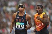 8 September 2008; USA's Nelacey Porter and his guide in action during the Men's 100m - T11. Beijing Paralympic Games 2008, National Stadium, Olympic Green, Beijing, China. Picture credit: Brian Lawless / SPORTSFILE