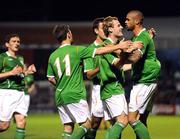 9 October 2008; Caleb Folan, right, Republic of Ireland XI, celebrates with team-mates, from left, Wes Hoolahan, Darron Gibson, and Anthony Stokes after scoring his side's first goal. Representative Game, Republic of Ireland XI v Nottingham Forest, Dalymount Park, Dublin. Picture credit: Brian Lawless / SPORTSFILE