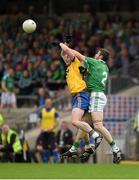 12 July 2015; Ciaran Murtagh, Roscommon, in action against Mickey Jones, Fermamagh. GAA Football All-Ireland Senior Championship, Round 3A, Fermamagh v Roscommon, Brewster Park, Fermanagh. Photo by Sportsfile