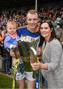 12 July 2015; Tipperary's Lar Corbett holds the cup with his wife Elaine and one year old daughter Fay after the game. Munster GAA Hurling Senior Championship Final, Tipperary v Waterford, Semple Stadium, Thurles, Co. Tipperary. Picture credit: Ray McManus / SPORTSFILE